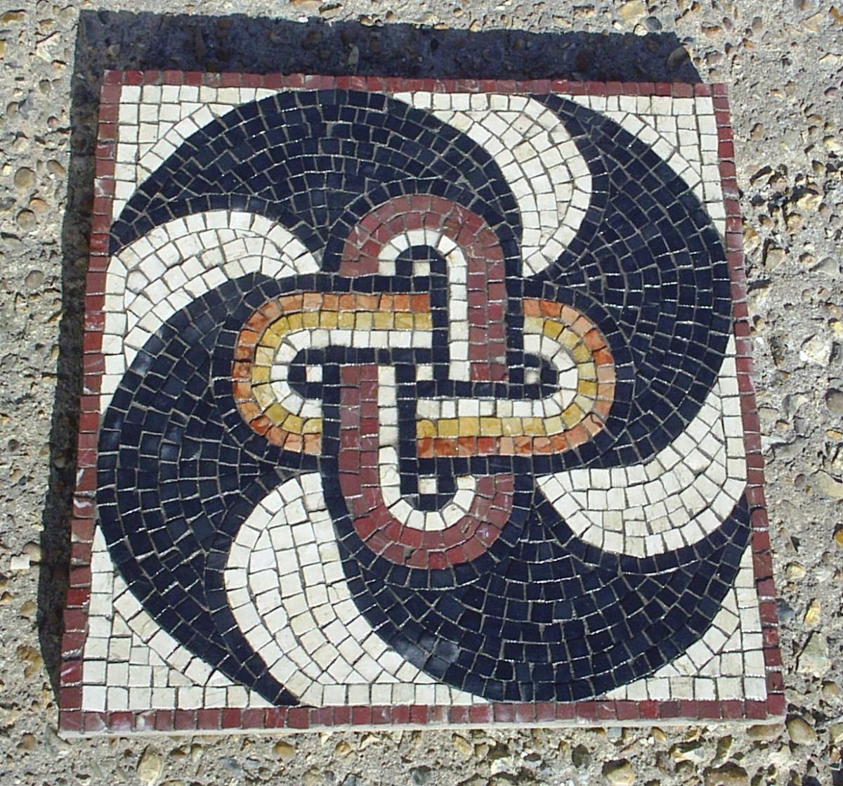 Swastika-peltae pattern with central knot. marble mosaic on a paving slab, 400mm x 400mm
