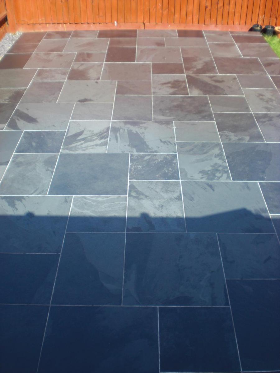 Black slate patio in modular pattern