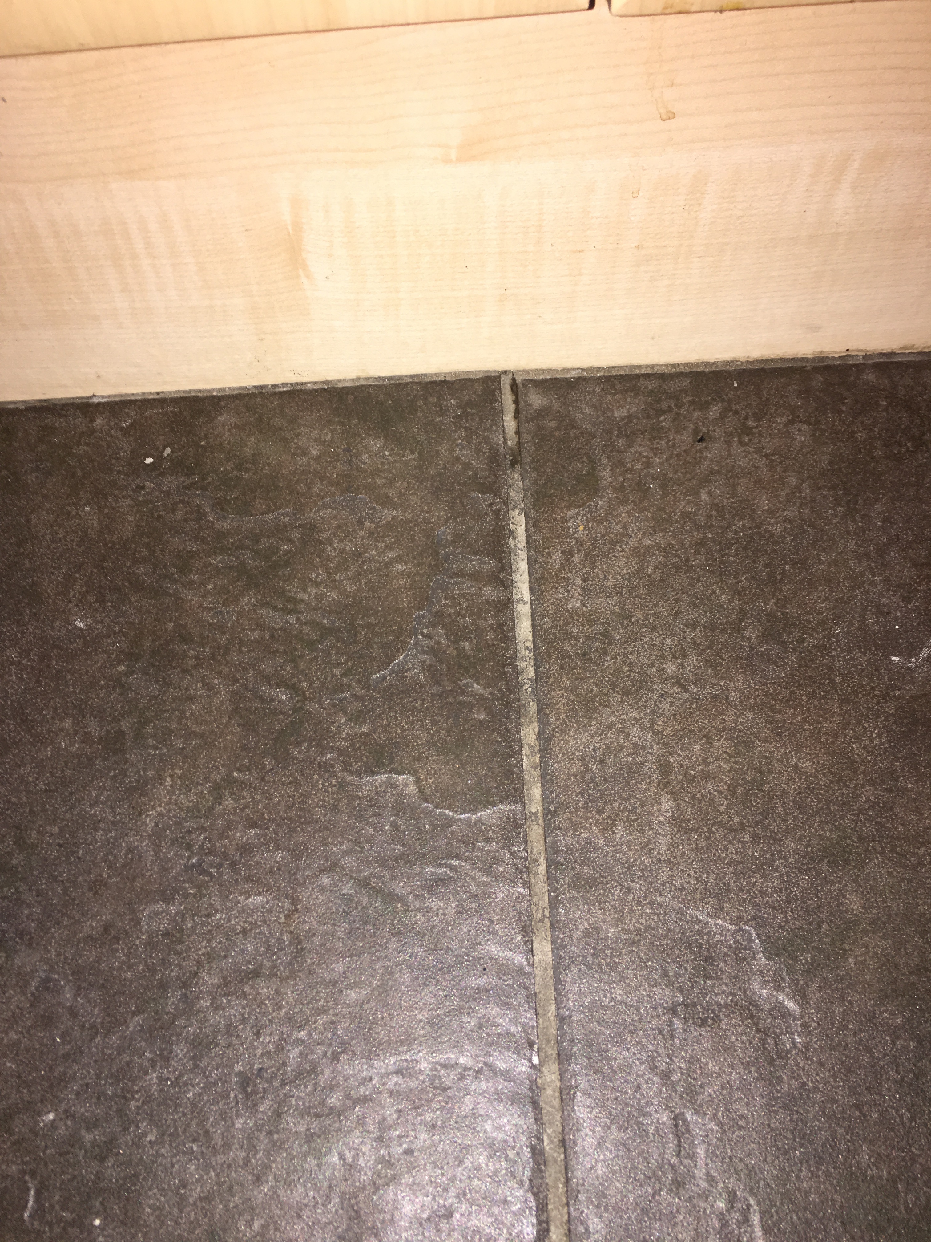 Water stain between tiles 2 and 3